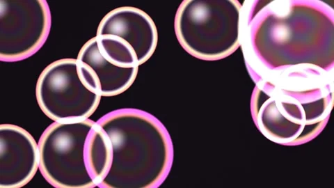 Bubbles floating on a black background with pink highlights Vídeo Stock 338011153