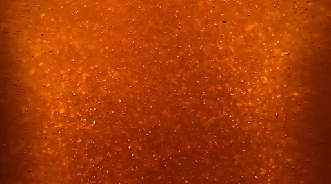 Bubbles floating up in the liquid drink Stock Footage 63315117