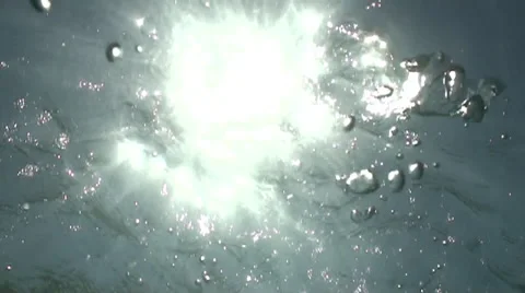 Bubbles floating toward ocen surface slow motion Stock Footage 54294457
