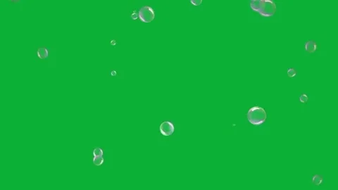 Bubbles floating upward on green screen. Stock Footage 335702933
