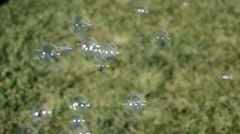 Bubbles flying over green background 動画素材 11425145