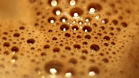 Bubbles with foam with bokeh effect on surface of hot cacao. Stock Footage 205914460