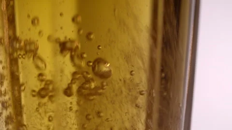 Bubbles Forming in Beer Glass Stock Footage 53042848