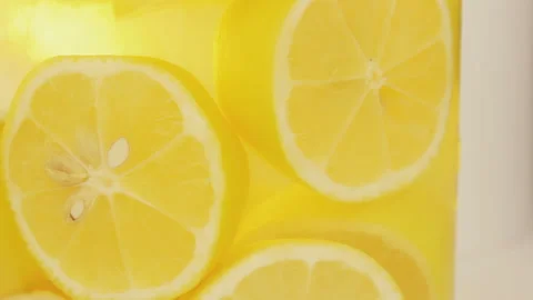 Bubbles Of Gas In Jar With Lemon Halves In The Water Stock Footage 117355649