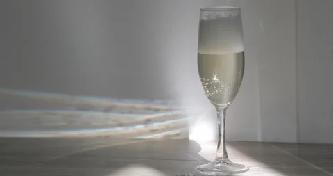 Bubbles in glass of champagne close up Stock Footage 141883355