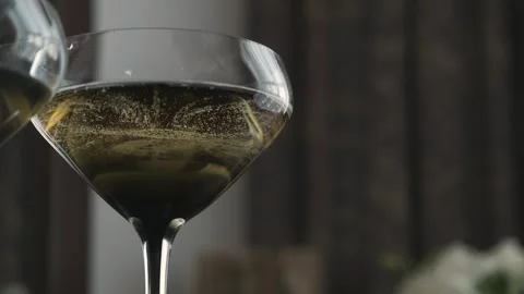 Bubbles in a glass of champagne Stock Footage 305305959