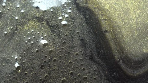 Bubbles From Gold Paint In The Water Stock Footage 194184616