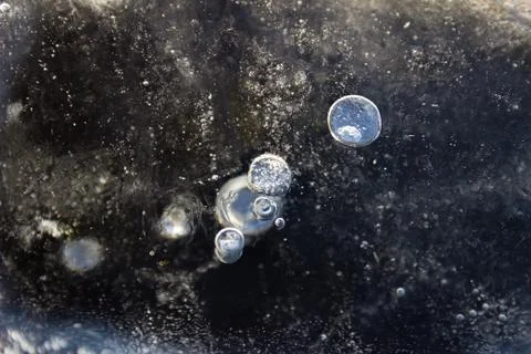 Bubbles in ice 库存照片