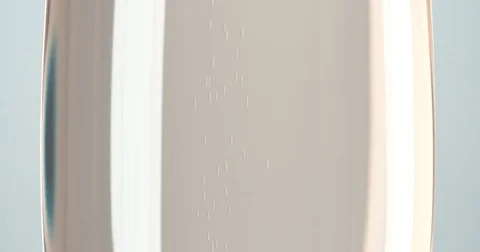 Bubbles inside a glass of champagne. 4K Stock Footage 78484064