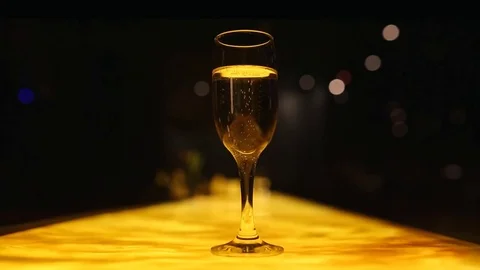 Bubbles inside a glass of champagne Stock Footage 79654911