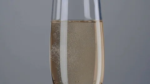 Bubbles inside a glass of champagne. Slow motion Stock Footage 78484137