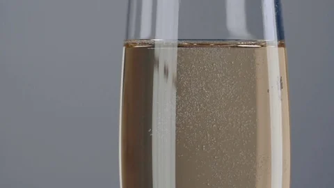 Bubbles inside a glass of champagne. Slow motion Stock Footage 78484402