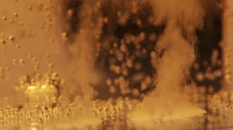 Bubbles in the liquid container glass ascend Stock Footage 68280587