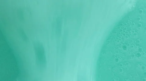 Bubbles in the liquid container glass ascend Stock Footage 68280752