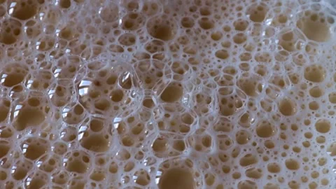 Bubbles in the milk foam Stock Footage 337706190