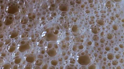 Bubbles in the milk foam Stock Footage 337706252