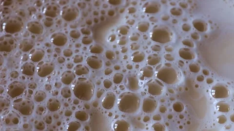 Bubbles in the milk foam Stock Footage 337706401