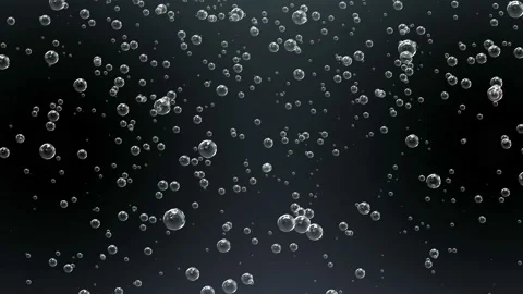 Bubbles from mineral water, soda in a glass on a black background. Many bubbles Stock Footage