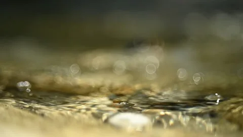 Bubbles on a mountain river with bubble bokeh (close up, slow motion) V2 스톡 동영상 211756260