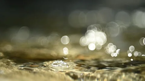 Bubbles on a mountain river with bubble bokeh (close up, slow motion) Stock-Footage 211756261
