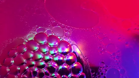Bubbles over colored lights Stock Footage 294802419