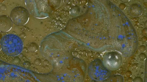 Bubbles as Paint Is Mixed Stock Footage 208750487