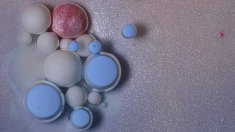 Bubbles of paint in oil. Macro abstraction Stock Footage 169726393