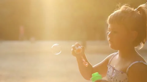 Bubbles in the park Stock Footage 12212601