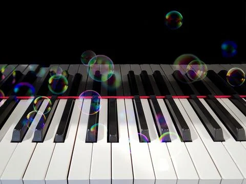 Bubbles on Piano Keyboard Stock Photos