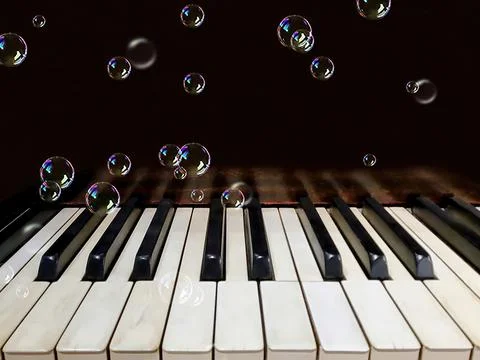Bubbles on Piano Keys Stock Photos