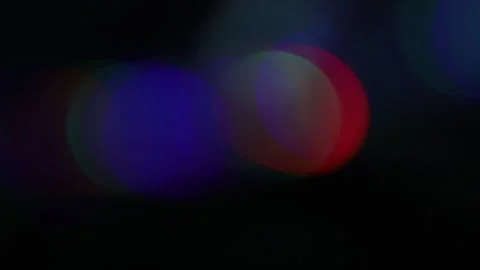 Bubbles with rainbow bokeh light on black background Stock-Footage 309491033