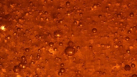Bubbles on red background slow motion Stock Footage 128244238