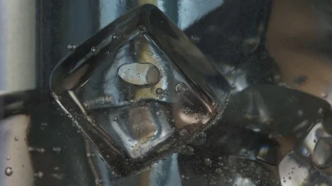 Bubbles Rise Around Ice Cubes Stock Footage 76426151