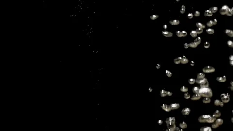 Bubbles rise up in black water Stock Footage 89771510