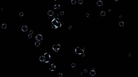 Bubbles rising against black background creating dynamic abstract art Stock Footage 327594550