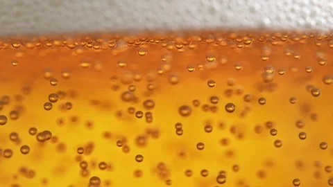Bubbles Rising to the Beer Head in Macro and Slow Motion. Stock Footage 271109082