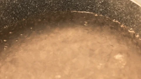 The bubbles rising from the bottom of the pot. Stock Footage 107091390