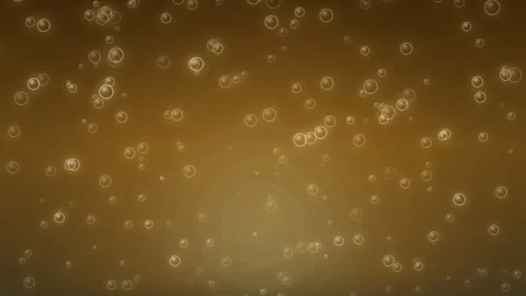 Bubbles rising in a drink with a brown background and soft light Stock Footage 337064398