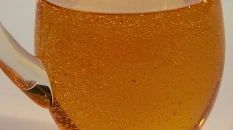 Bubbles rising in energy drink Stock Footage 55296603