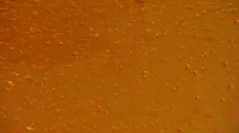 Bubbles rising in energy drink Stock Footage 55296618