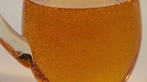 Bubbles rising in energy drink Stock Footage 55296862