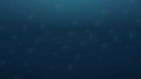Bubbles rising slowly through deep blue water Stock Footage 335883918