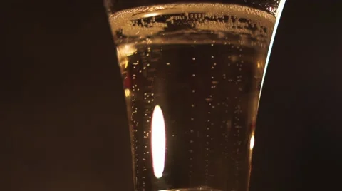 Bubbles rising in a sparkling wine glass. Closeup. Stock Footage 42820294