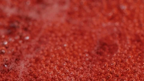 Bubbles rising in thick, red liquid making an abstract background. Stock Footage 89504451