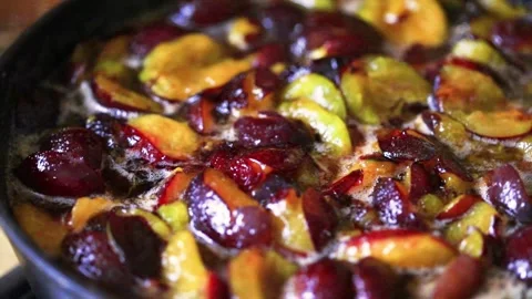 Bubbles rising in thick, red liquid making an abstract background. Macro shot of 動画素材 139357037