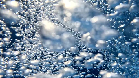 Bubbles rising in underwater scene captured from different angles Stock Footage 325619992