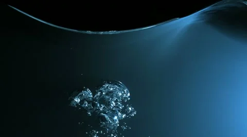 Bubbles rising in water, Slow Motion Stock Footage 18128970