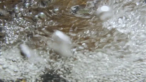 Bubbles in the river Stock Footage 143776575