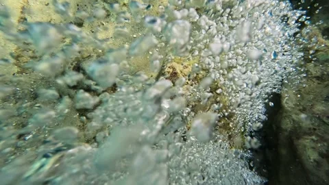 Bubbles from the rocks (slow motion) Stock Footage 318184595