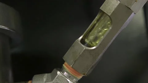 A Bubbles spinning rapidly inside metal industrial tube Stock Footage 155538758
